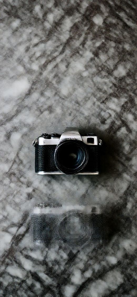 Aesthetic Infinite Film Camera On Wallpaper